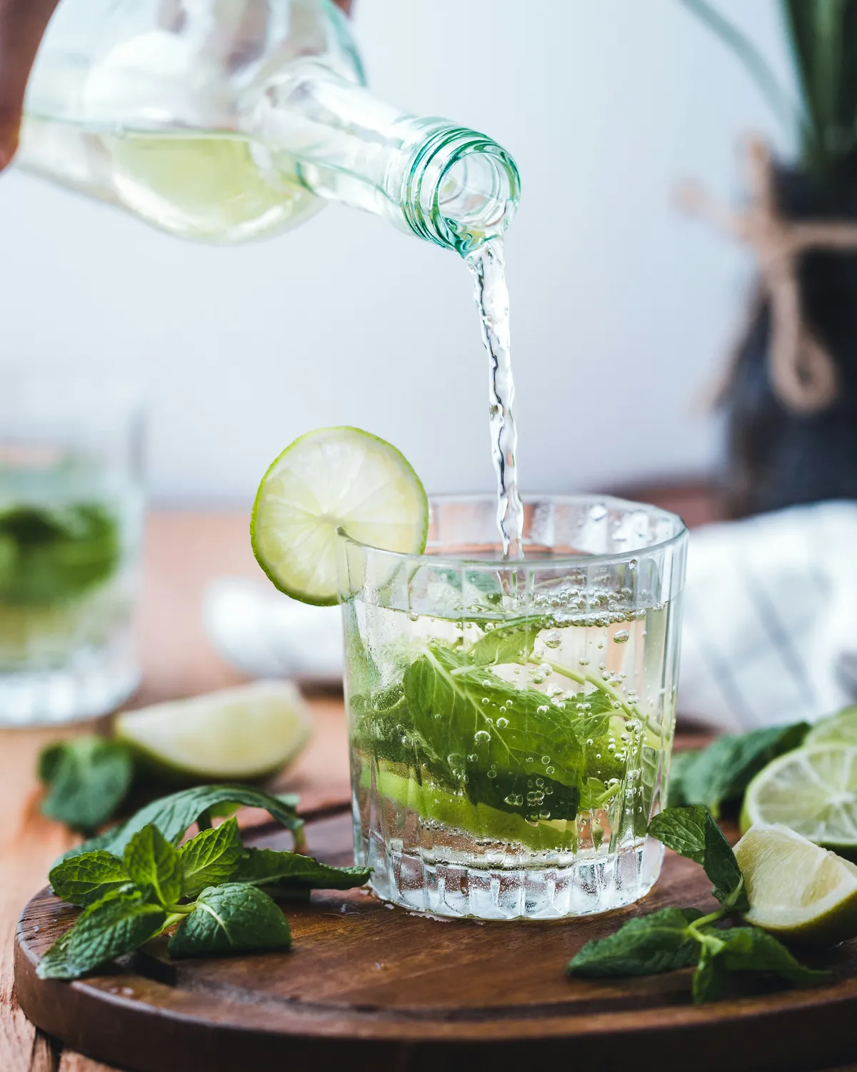 Glass of water with mint for hydration and kidney stone prevention