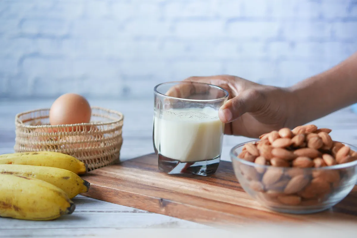 Calcium- and vitamin D-rich foods: milk, nuts, eggs, and banana for bone health